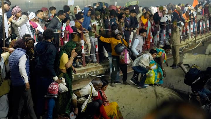 Devotees are seen after a stampede occurred at Sangam on 'Mauni Amavasya' during the ongoing 'Maha Kumbh Mela' festival, in Prayagraj on January 29, 2025.