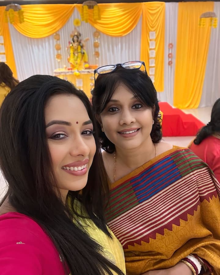 In her photos, Rupali wore a bright yellow saree and posed with her husband Ashwin K. Verma, son Rudransh, and others.