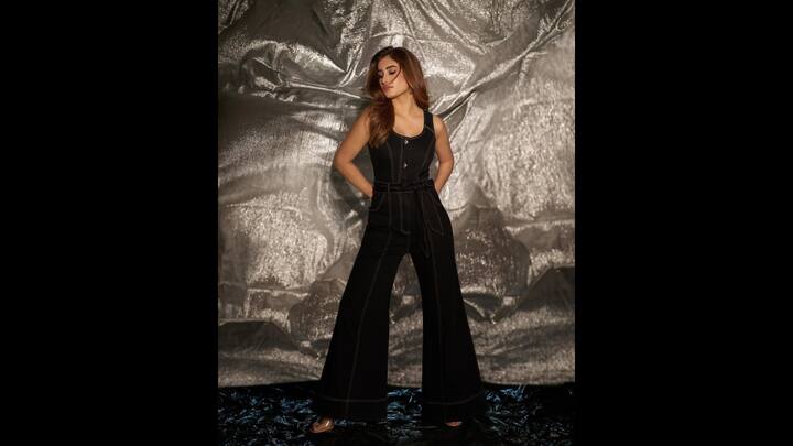 8. Denim Co-ord Jumpsuit: The actress looked effortlessly stylish in a sleek and elegant denim jumpsuit. Rasha's outfit featured a bell bottom style lower that added a touch of retro charm. The jumpsuit has been cinched at the waist with a denim belt, beautifully tied into a bow. Her denim attire seamlessly blended sophistication with modern flair. (Image Source: Instagram/@rashathadani)