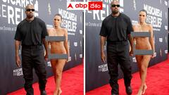 ఇదేం మాయరోగం - గ్రామీ రెడ్ కార్పెట్ మీద బట్టలిప్పేసిన సింగర్ భార్య - వీడియో వైరల్