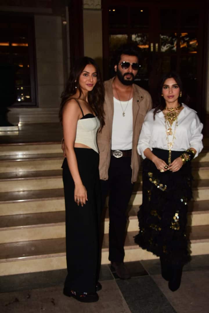 Arjun Kapoor exuded swag in a white t-shirt and black jeans that he paired with a brown jacket.