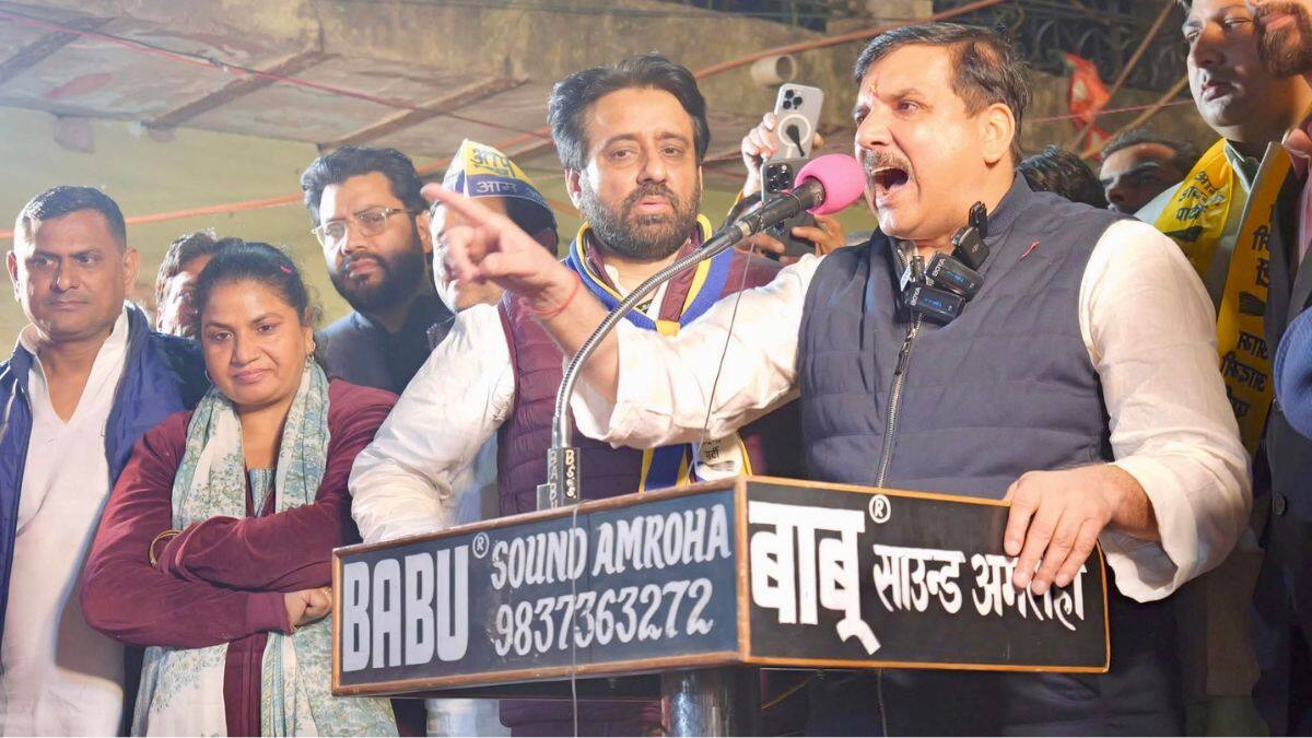 AAP's Sanjay Singh during a poll campaign in Okhla assembly. AAP MLA Amanatullah Khan can be seen on his left. (Image:  X | @KhanAmanatullah)