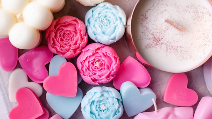 Rose-Scented Candles: With their gentle floral fragrance, these candles create a soothing atmosphere. Ideal for relaxation and setting a romantic mood. (Image Source: Canva)