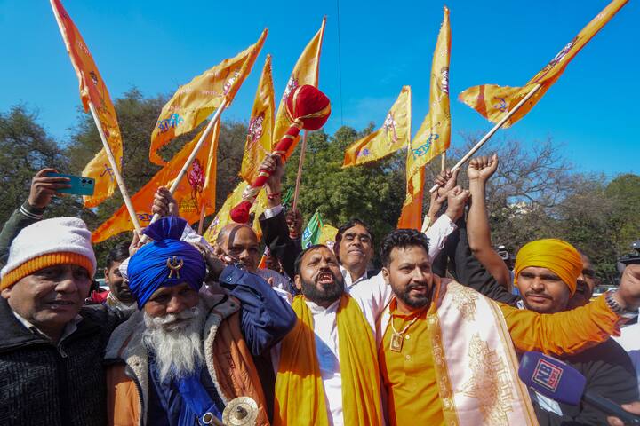 BJP supporters in New Delhi, celebrate after ECI counting shows the party securing 48 seats in Delhi Assembly polls, Saturday, Feb. 8, 2025. (Image Source: PTI)