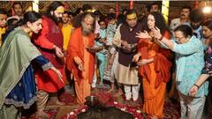 पत्नी, बेटे, बहू, पोतों संग मुकेश अंबानी ने किया संगम में स्नान, देखें तस्वीरें