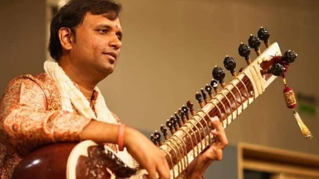 Bhagirath Bhatt Weaves Magic With His Sitar Tunes In 'Loveyapa' Bhagirath Bhatt Weaves Magic With His Sitar Tunes In Bollywood Films Bhagirath Bhatt Weaves Magic With His Sitar Tunes In 'Loveyapa'