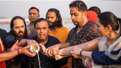 पत्नी, बेटे, बहू, पोतों संग मुकेश अंबानी ने किया संगम में स्नान, देखें तस्वीरें