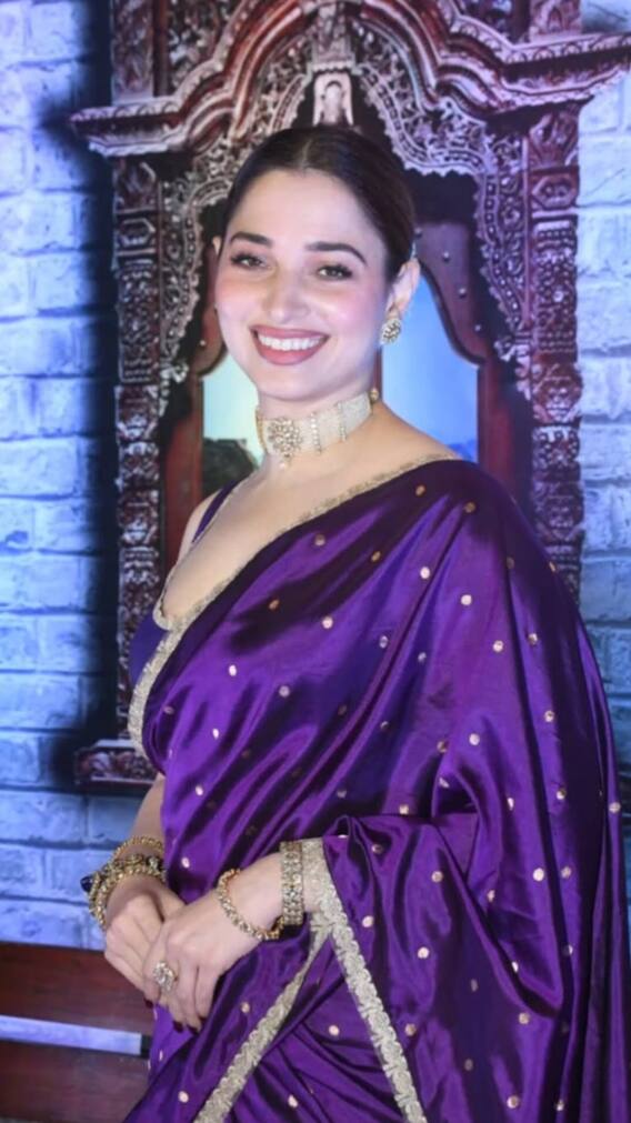 डार्क पर्पल साड़ी,गले में चोकर हार पहने एक इवेंट में जाती दिखीं तमन्ना भाटिया
