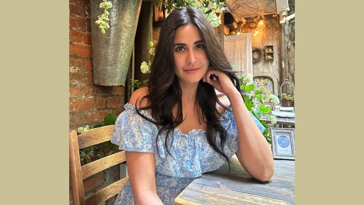 Katrina Kaif in Rafal Dress: Katrina Kaif looks glamorous in her floral print off-shoulder ruffle dress. The flow silhouette added with a playful design makes it the perfect option to escape a chic on the beach yet. (Image Source: Instagram/ Catrincafe)