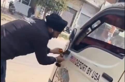 'Deported From US' Becomes New Status Symbol As Video Of Man Sticking Label On His Truck Goes Viral: Watch 'Deported From US' Becomes New Status Symbol As Video Of Man Sticking Label On His Truck Goes Viral: Watch