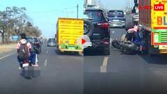 साक्षात मौत देखकर आए तीन लोग, कट मारते हुए ट्रक में जा घुसी बाइक- खौफनाक वीडियो हुआ वायरल