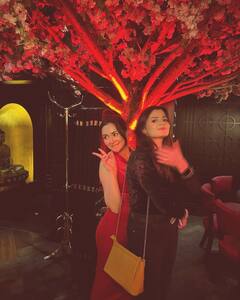 Hania Aamir Turns Heads In A Fiery Red Dress For Her Birthday Celebration