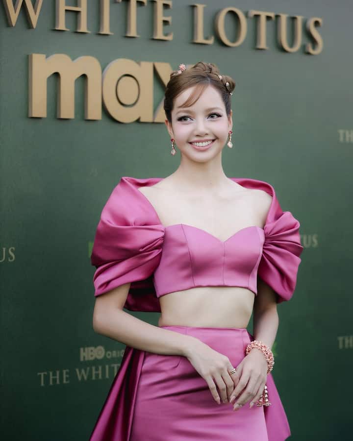 Her stunning outfit was completed with pink pumps and Bvlgari jewelry, staying true to her fashion-forward style.