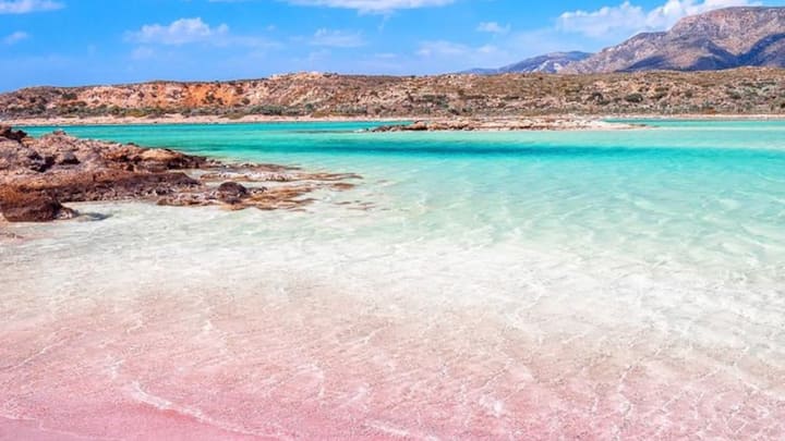 Elafonissi Beach, Crete, Greece: Known for its stunning pink sands with crystal clear waters, this beach is located in Greece. Shallow lagoons are available for families to enjoy the place, while swimming and snorkelling are meant for the adventurous. This beach is a postcard view spot to visit at sunset time.  (Image Source: Twitter/ xmuse_)