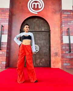 PICS: Tejasswi Prakash Rocks A Black Bralette And Red Sweatpants For Effortless Street Style