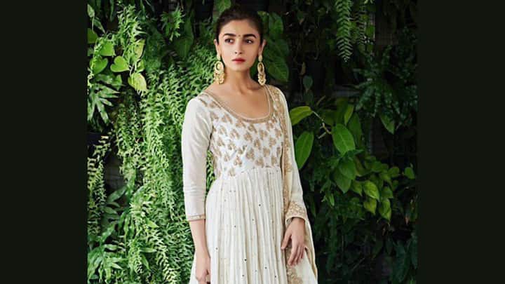Looking straight out of a fairytale, Alia dazzled in another white Anarkali with intricate gold threadwork and mukaish detailing. This outfit beautifully reflected her elegance and grace. (Image Source: Instagram/ aliaabhatt)