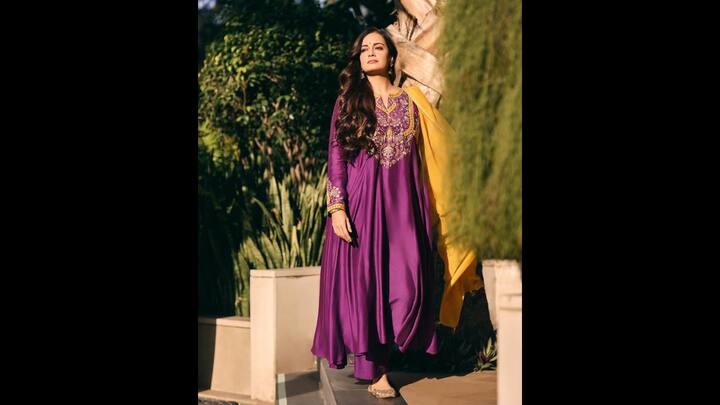1. Dia Mirza: Dia Mirza looked ethereal in a stunning heirloom embroidered flowing suit set. With minimal accessories and juttis, she let the outfit shine. The actress paired her suit set with a contrasting yellow dupatta. (Image Source: Instagram/@diamirzaofficial)