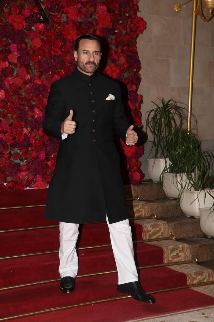 Saif complemented Kareena’s look in a black bandhgala paired with white pyjamas.