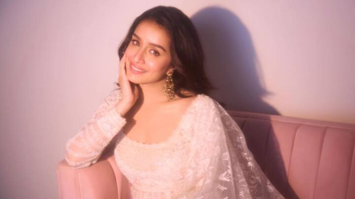 Shraddha Kapoor wears a white anarkali gown, all classic with an air of grace. The neo-drape silhouette has a contrast tone-on-tone embroidery style teamed with a flowing dupatta and golden chandbalis that make it respected forever as a festive pick. (Image Source: Instagram/ shraddhakapoor)