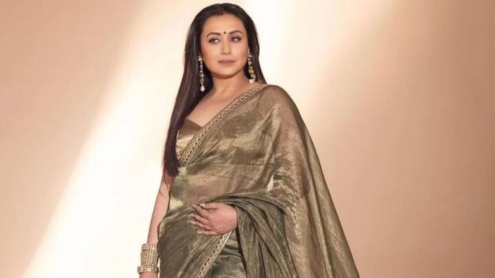 Recreate Rani's dazzling festive look with a copper-hued saree that reflects all the light. Opt for one with a soft sheen and finishing gold border designs, teaming it with gold jewels for that added traditional touch. (Image Source: Instagram/ ranimukherjeeeofficial)
