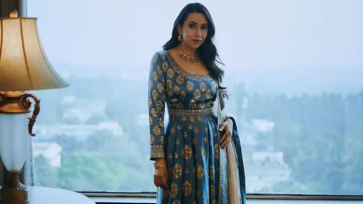 Pastel Blue Anarkali Suit: Karisma Kapoor's pastel blue Anarkali suit looks very elegant and charming and is the perfect pick for weddings or specially celebrated festivals. With fine embroidery and delicate embellishments, it looks royal; the pastel jewels adorn the outfit. (Image Source: Instagram/ therealkarismakapoor)