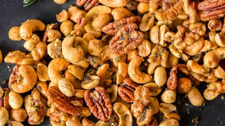 8. Seasoned Nuts: Seasoned Nuts are nutritious snacks that consist of roasted nut that are seasoned with herbs and spices. The seasoning enhances the taste of the nuts making them the perfect snack to curb cravings. (Image Source: Pinterest/nospoonn)