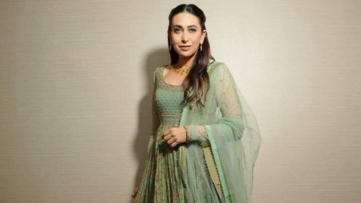 Mint Green Silk & Cotton Anarkali: Designed in mint green silk and cotton, this Anarkali had sheer full-length sleeves, a scoop neckline, and borders and cuffs adorned with gold gota work. A pleated ankle-length skirt with a churidar and matching net dupatta with dual-tone gota borders adds further grace. (Image Source: Instagram/ therealkarismakapoor)
