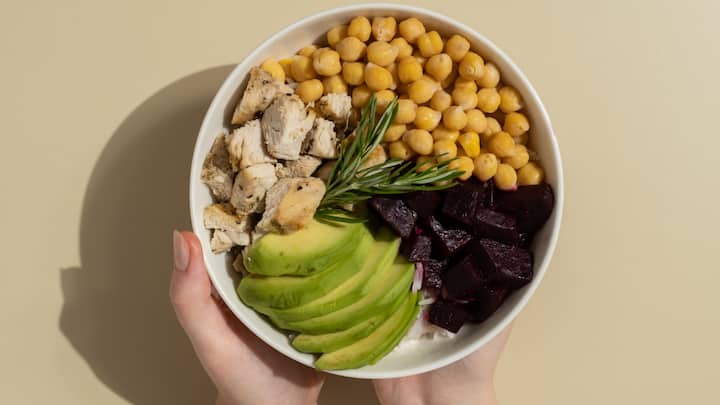 1. Nourish Your Body With Healthy Foods: What you eat directly affects how you feel. A well-balanced diet rich in fruits, vegetables, whole grains, and lean proteins provides essential nutrients that fuel your body and mind. Hydration is equally important drinking enough water keeps your body functioning optimally and improves energy levels. (Image Source: Canva)