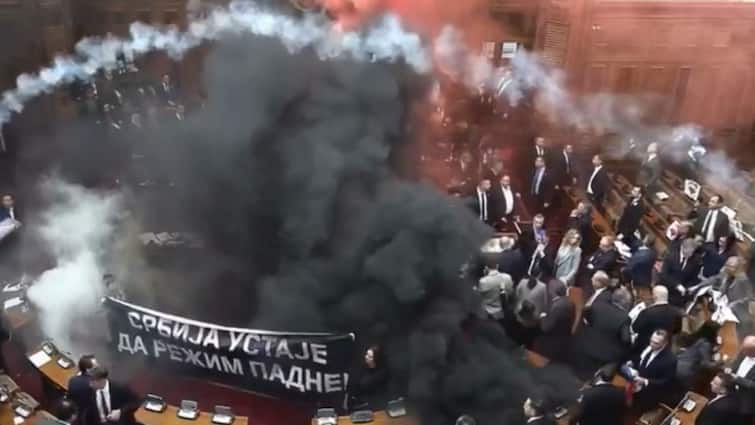 Chaos In Serbian Parliament As Opposition Hurl Smoke Grenades, Flares In Protest: WATCH