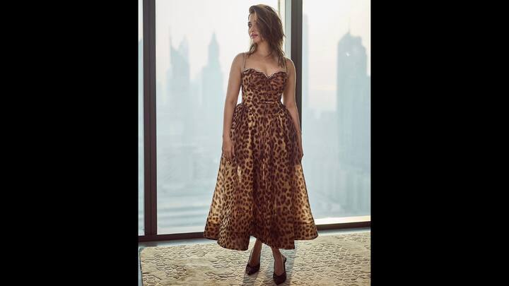 8. Animal Print Dress: Tamannaah served a bold look in her leopard print dress. The dress had a structured silhouette with a corset bodice. It has delicate jewelled straps and neckline that added a touch of elegance. She complemented her outfit with matching heels and minimal jewellery. (Image Source: Instagram/@tamannaahspeaks_)