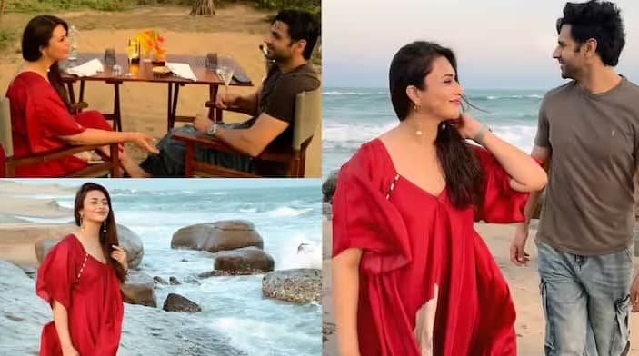 Divyanka Tripathi Beach Photos: અભિનેત્રી દિવ્યાંકા ત્રિપાઠીએ પતિ વિવેક દહિયા સાથેની તેની રોમેન્ટિક ડેટની ઘણી તસવીરો સોશિયલ મીડિયા પર શેર કરી છે. જેમાં તે બીચ પર પોતાના દેશી લુકને ફ્લોન્ટ કરતી જોવા મળી હતી. ટીવીની સુંદર અને લોકપ્રિય અભિનેત્રી દિવ્યાંકા ત્રિપાઠી ભલે અભિનયથી દૂર હોય, પરંતુ તે સોશિયલ મીડિયા દ્વારા હંમેશા તેના ચાહકો સાથે જોડાયેલી રહે છે. તાજેતરમાં અભિનેત્રીએ ચાહકોને તેની રોમેન્ટિક ડેટની ઝલક બતાવી હતી. જેમાં તે તેના પતિ વિવેક દહિયા સાથે પોઝ આપતી જોવા મળી હતી.