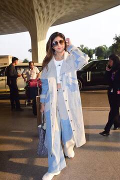 એરપોર્ટ પર શિલ્પા શેટ્ટી... વ્હાઇટ ક્રૉપ ટૉપ સાથે લૉન્ગ કૉટ, લહેરાતી ઝુલ્ફો અને કાળા ચશ્માએ લૂંટી લીધી મહેફિલ