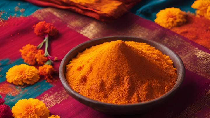 Yellow: Mix haldi (turmeric) with besan (gram flour) for a vibrant yellow colour that doubles as a face mask. (Image Source: Canva)
