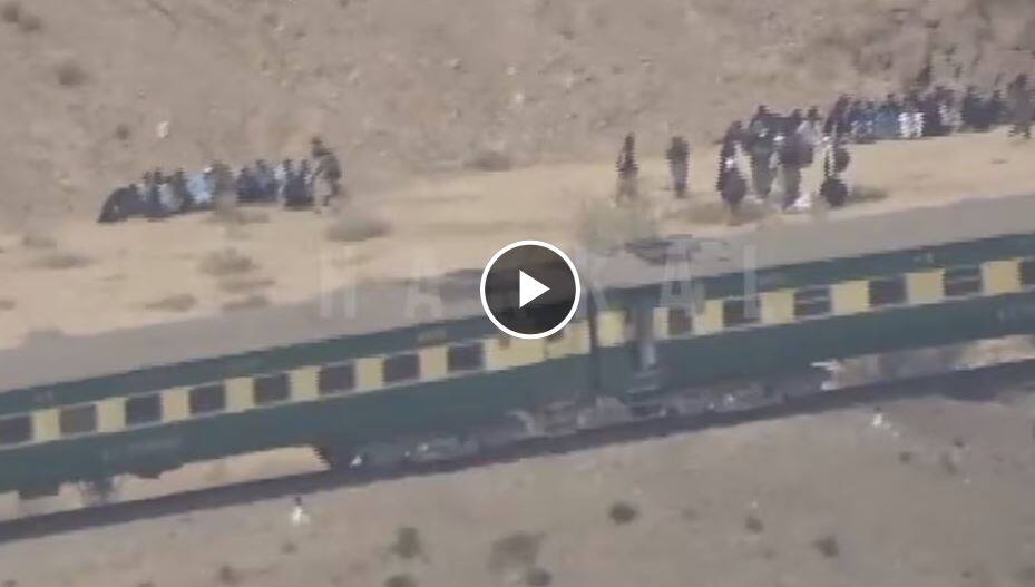 Baloch Army released a video of the train hijacking ਕਿਵੇਂ ਹਾਈਜੈਕ ਕੀਤੀ ਗਈ ਜਾਫਰ ਟਰੇਨ, ਕਿੱਥੇ ਰੱਖੇ ਨੇ ਬੰਧਕ, ਬਲੋਚ ਆਰਮੀ ਨੇ ਬੇਖੌਫ ਹੋ ਕੇ ਜਾਰੀ ਕੀਤੀ ਵੀਡੀਓ, ਹਰ ਯਾਤਰੀ ਦੇ ਕੋਲ ਬੰਬ ਬੰਨ੍ਹ ਕੇ ਬੈਠੇ ਬਾਗ਼ੀ, ਦੇਖੋ ਵੀਡੀਓ