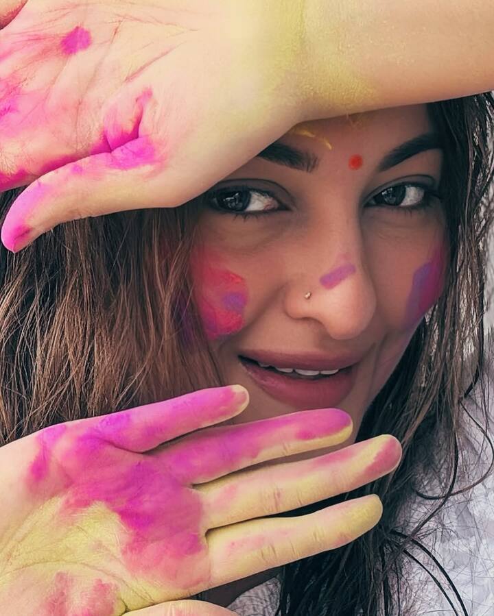 Sonakshi Sinha is celebrating Holi on the set of her upcoming film, Jatadhara. Giving her Instagram followers a glimpse of the festivities, she shared a series of lively pictures.