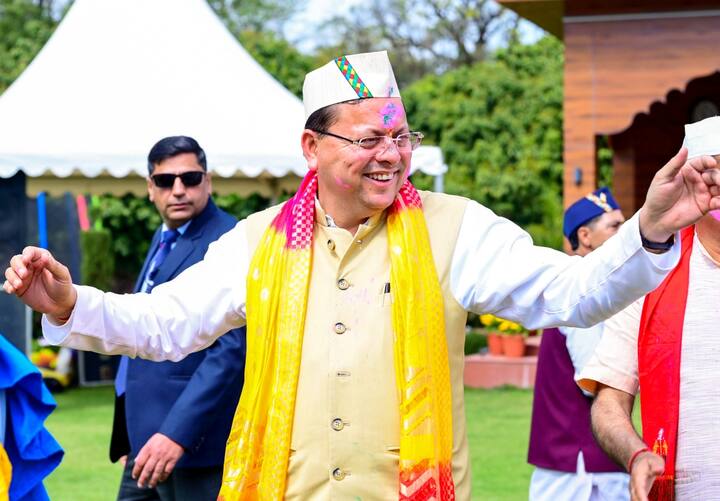 Dhami also celebrated Holi at his residence in Dehradun. (Photo: PTI)