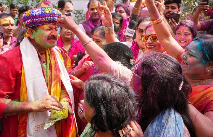 BJP MP Manoj Tiwari hosted a Holi gathering at his residence in the national capital. (Photo: PTI)