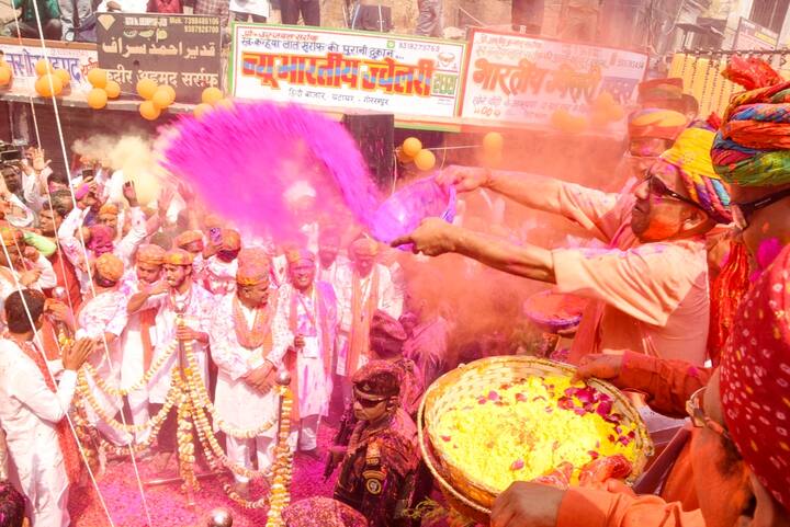 Uttar Pradesh Chief Minister Yogi Adityanath was seen spreading 'gulaal' on people during a Holi procession in Gorakhpur. (Photo: PTI)