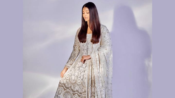 Aishwarya Rai Bachchan's Classic White Beauty: Perfect for an elegant Eid look, Aishwarya’s kalidar white Anarkali is all grace, with detailed Kashmiri thread work and gota-patti embellishments as the finishing touch. The outfit carries an appeal with an embroidered dupatta to back it. (Image Source: Instagram/ aishwaryaraibachchan_arb)