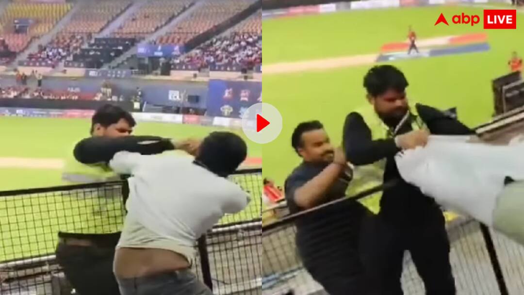 टिकट का पैसा हो गया वसूल! मैच के दौरान गार्ड और फैन के बीच हुई मारपीट, वीडियो हुआ वायरल During ECL final guards and spectators clashed with each other fighting video viral टिकट का पैसा हो गया वसूल! मैच के दौरान गार्ड और फैन के बीच हुई मारपीट, वीडियो हुआ वायरल