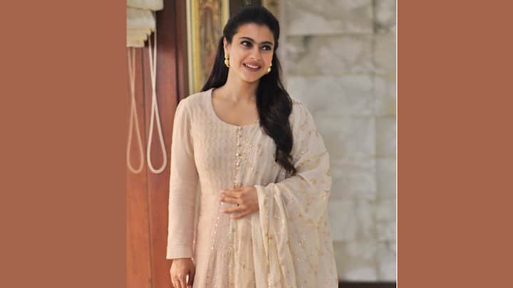 Kajol's Grace in Blush Pink: This gorgeous Anarkali suit in blush pink looks graceful and is a perfect fit for festivals. Paired with gold chandeliers and nude wedges and a half-up, half-down hairstyle, it creates a very classy festive look. (Image Source: Instagram/ kajol)