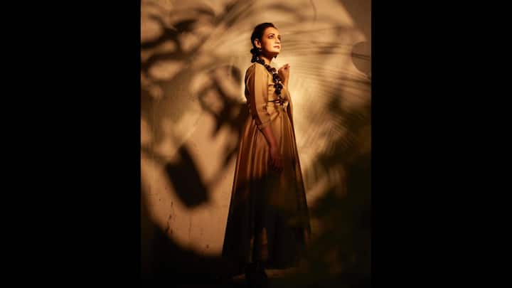 7. Dia Mirza: Dia Mirza wore an elegant golden Anarkali suit that had a flowing silhouette and minimalist design. The timeless monochromatic traditional look gave the actress a graceful look making it perfect for festivities. (Image Source: Instagram/@diamirzaofficial)