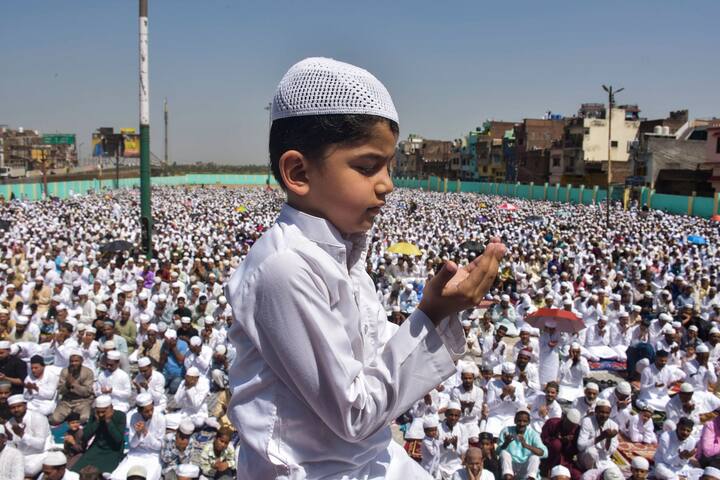 A young Muslim devotee offers 'namaz' on the last Friday of the holy month of Ramzan, at Jama Masjid, in Moradabad, Uttar Pradesh, Friday, March 28, 2025. (Source: PTI)