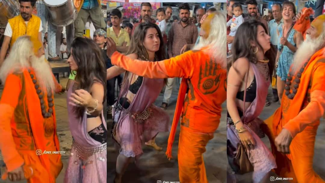 foreign girl dancing with baba ji viral video on social Media marathi news आयुष्यभर तपश्चर्या केली, पण विदेशी मेनका दिसताच सगळं पाण्यात; साधूबाबा तरुणीसोबत आडवा तिडवा नाचला Video