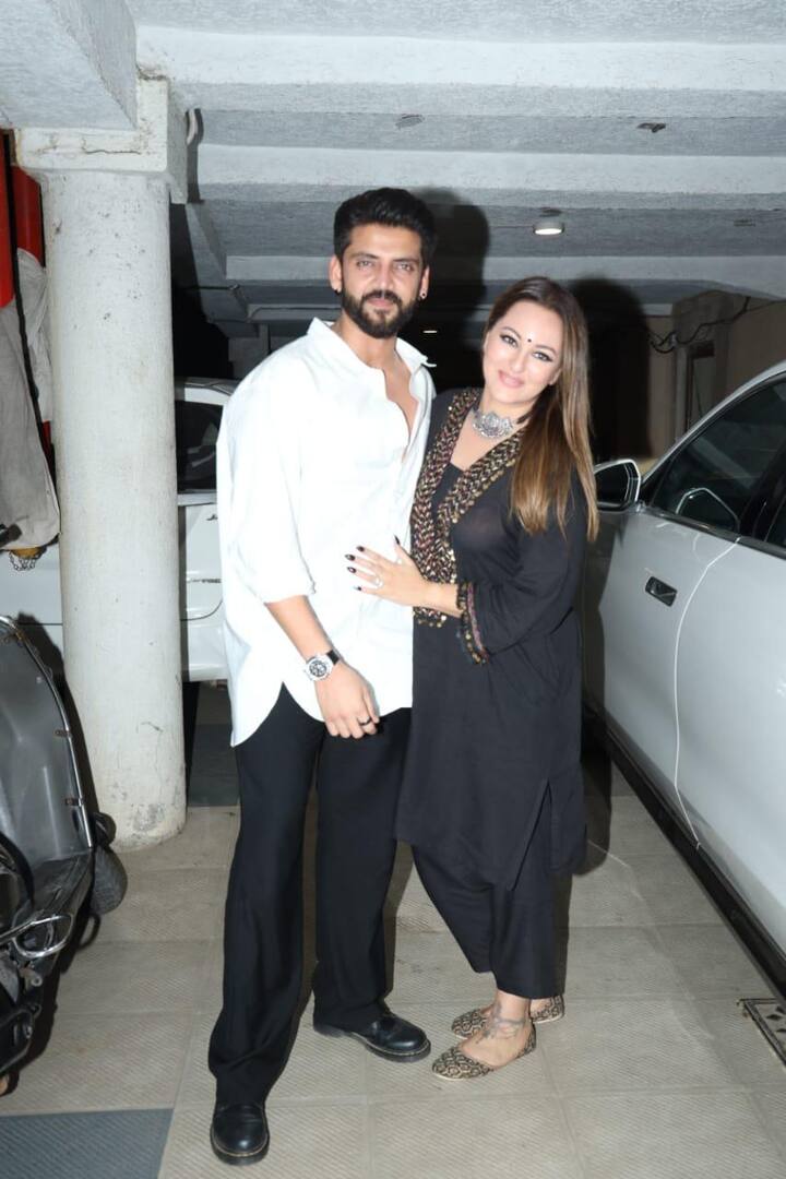Zaheer was wearing a white shirt with black paint. Sonakshi appeared in an all black look.