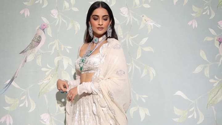 Sonam Kapoor is donned in this white floral-print lehenga with fine silver embroidery, giving it an air of royalty. With emerald-tiered and diamond jewellery, this is the choice for Navratri for an elegance of grandeur. (Image Source: Instagram/ sonamkapoor)