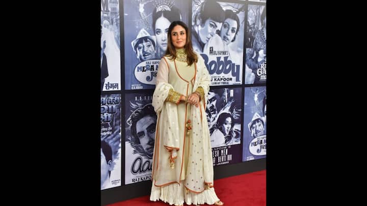 2. Royal Ivory Suit: Kareena Kapoor stunned in an ivory three piece suit set that she paired with a sharara. The ethnic outfit had golden and rust orange detailing. The sleeve ends of the kurta had heavy detailing on it that made it ideal for festive celebrations. (Image Source: Instagram/@nari.kesari1)
