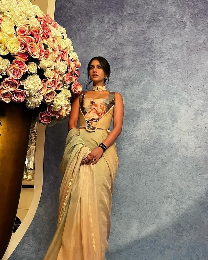 Radhika’s corset from the classic Vivienne Westwood collection featured an ivory white silk fabric adorned with François Boucher's painting of Daphnis and Chloe.