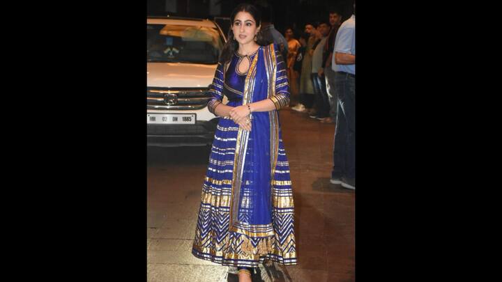6. Sara Ali Khan: Sara Ali Khan wore an ankle length Anarkali kurta that had traditional motifs and zari detailing. She styled her look with a matching net dupatta. The actress's outfit exuded regal charm, making it perfect for festivities. (Image Source: Pinterest/bollybubble)