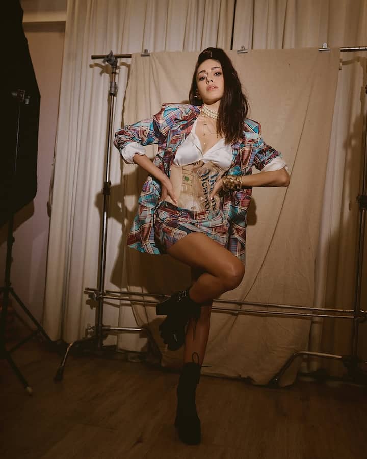 The actress was seen sporting a plaid co-ord set featuring an oversized blazer and a mini skirt, both tailored in a bold, asymmetric cut that played with the brand’s signature deconstructed style.